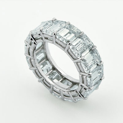 Handmade eternity band in platinum with emerald cut diamonds